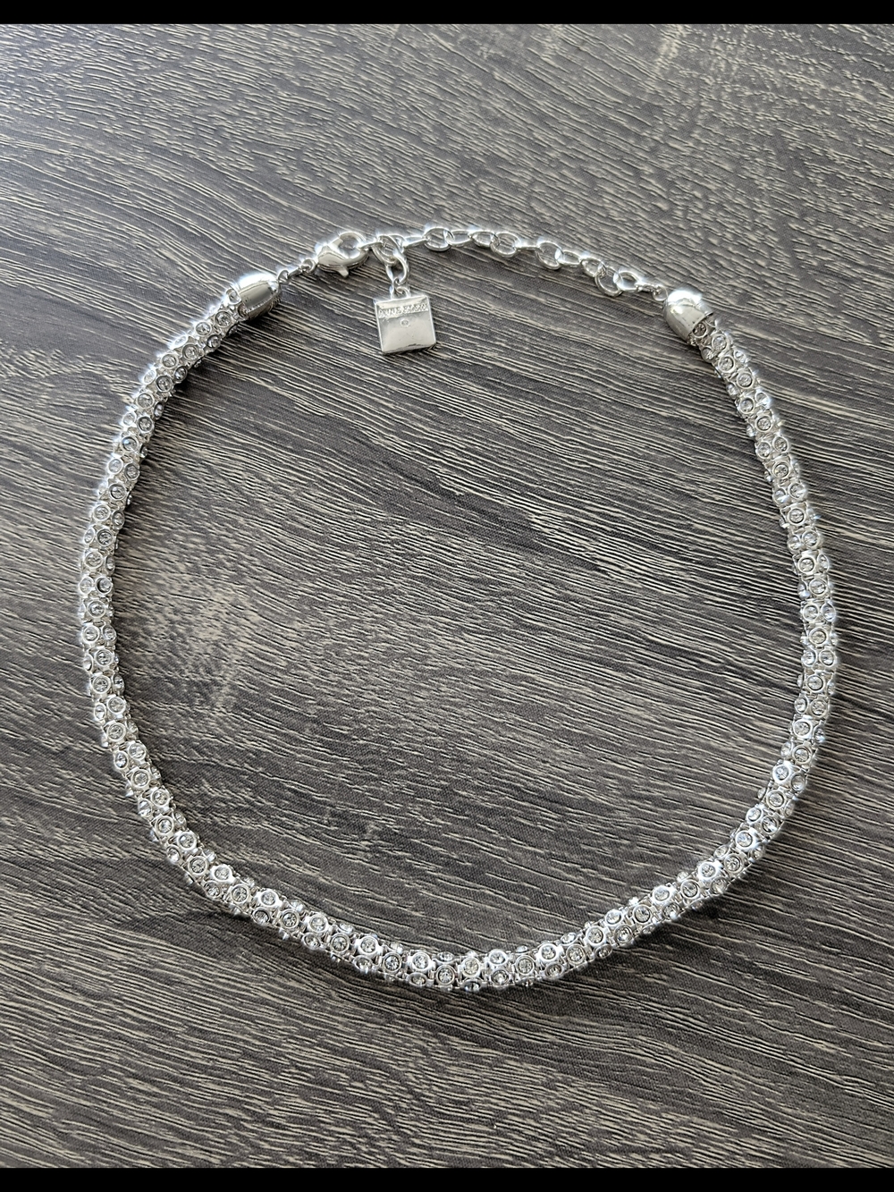 Anne Klein silver tone crystal necklace. Tubular pavé collar 16-19 in.